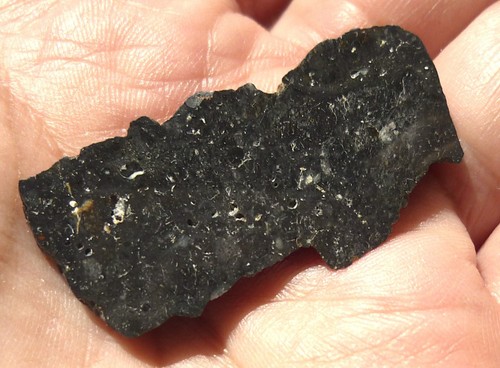 Black lunar meteorite nwa - black,
